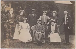 Gardeners Prints: Early 20th century photograph of a group of servants posing for the camera in a garden