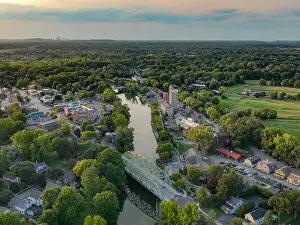 Early evening aerial photo of Schoen Place and the Erie Canal in the Village of Pittsford, New York