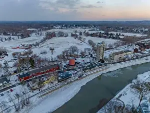 Sky Landscape Prints: Early evening winter aerial photo of Schoen Place and the Erie Canal in the Village of Pittsford