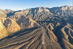 Early light shines on the massive geologic formations in Red Rock Canyon National Conservation Area, located just outside of Las Vegas, NV