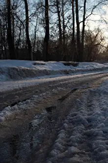 Country Road Prints: early spring, melting ice and water on a country road