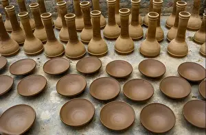 Jammu Prints: Earthen pots left for sundry at a workshop in the outskirts of Srinagar