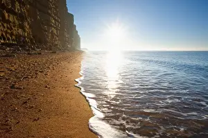 Morning Sun Prints: East Cliff in Morning Sun West Bay Dorset England