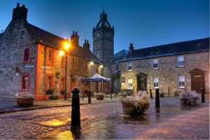 Street Lights Prints: East Kilbride Village showing Montgomery Arms and the Old Parish Church during early dawn