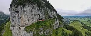Mountain Hut Prints: Ebenalp, Switzerland – 13 July 2024: drone view at Wildkirchli caves at Ebenalp in the Swiss alps