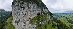 Mountain Hut Prints: Ebenalp, Switzerland – 13 July 2024: drone view at Wildkirchli caves at Ebenalp in the Swiss alps