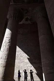 Colonnade Prints: Edfu, Egypt - 1 December 2012 Man in the shadows of the Edfu Temple
