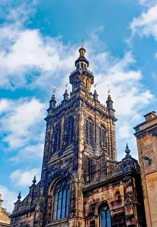 Steeple Prints: EDINBURGH, SCOTLAND - Aug 22, 2025: The ornate tower of the historic Tolbooth Kirk pierces the sky