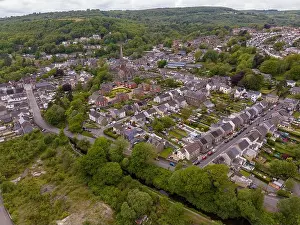 Editorial SWANSEA, UK - May 14, 2023: Drone view of Pontardawe town in the Swansea Valley featuring St Peter's Church