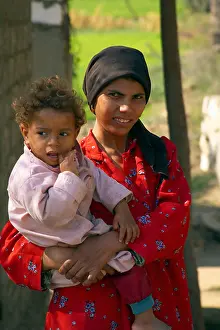 Facing Camera Prints: Egyptian Mother With Child