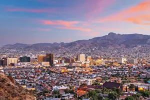 El Paso, Texas, USA downtown city skyline at dusk with Juarez, Mexico in the distance
