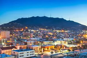 El Paso, Texas, USA downtown city skyline at dusk with Juarez, Mexico in the distance