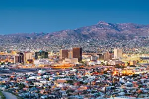 El Paso, Texas, USA downtown city skyline at dusk with Juarez, Mexico in the distance