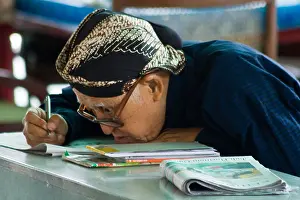 Java Prints: Elderly Man Studying Kraton or Sultan Palace Yogyakarta Java Indonesia