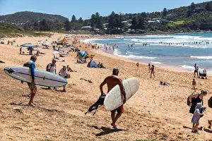Surfers Prints: Two elderly middle aged grey haired men carry their surfboards to the ocean at Avalon Beach
