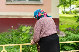 Human Face Prints: An elderly old lady in Russia. Pensioner on the street