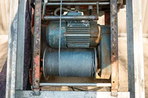 Construction Equipment Prints: Electric cable winch with steel cable and electric motor