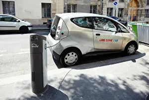 Hire Prints: Electric car charging in Paris