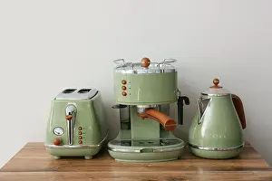 Appliances Prints: Electric kettle with coffee machine and toaster on counter against white wall