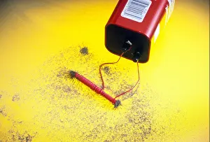 Nail Prints: Electromagnet made by wrapping wire around steel nail connected to battery