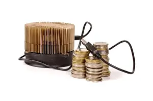 Miner Prints: Electronic device cryptocurrency Bitcoin miner and coins as a profit of mining