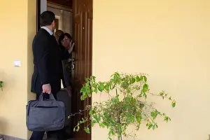 Salesman Prints: Elegant man with briefcase door-to-door salesman who persistently tries to convince