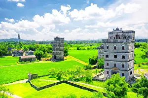 Guangdong Prints: An elevated view of the Kaiping Towers Daiolou scenic area and world heritage site Kaiping China on a sunny day
