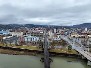 Elmira, NY, USA - 03-02-2024 - Cloudy winter aerial image of the downtown area in the City of Elmira