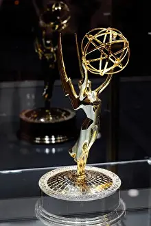 Robert K Chin Prints: An Emmy award statuette in a display case