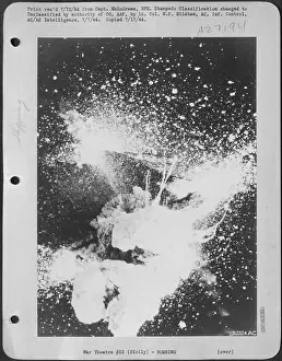 Tunisia Prints: Enemy supply ship blows up with terrific pyrotechnics under direct bomb hit from Northwest African Allied Air Forces