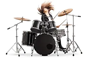 Throwing Prints: Energetic female drummer throwing her hair and playing drums isolated on white background