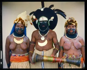 Tribes Prints: Enga man with his two wives, from the Southern Highlands of Papua New Guinea