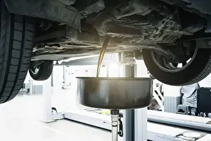 Wrench Prints: Engine oil change in car service