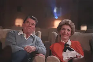 1986 Prints: English: President Reagan and Nancy Reagan watching a film in the White House Theater