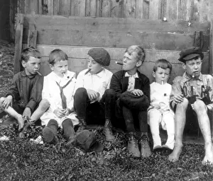 Addiction Prints: Entitled: 'The example' shows six boys smoking cigars