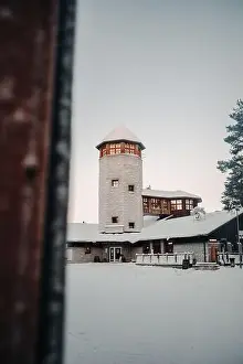 Northern Lights Prints: Entrance building in winter to wildlife park in Ranua, Lapland in snowy forest