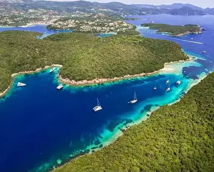 Epirus Prints: Epirus, Greece. Sivota - stunning aerial drone video of turquoise sea known as Blue Lagoon and unique beaches