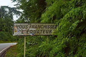 Equator Prints: Equator road sign in Gabon in French language, Africa