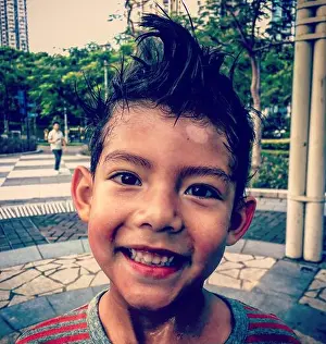 Hair Style Prints: Eurasian child portrait close up head shot with smile of 5 years old boy kid children looking at camera ans hapy joy