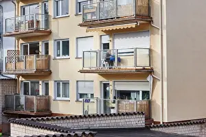 Hopeless Prints: Europe, Germany, Hesse, Frankfurt, Bornheim, smoking woman on balcony