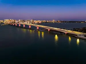 Evening aerial image of the Sarasota, Florida Skyline and Bridge Across Sarasota Bay
