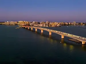 Evening aerial image of the Sarasota, Florida Skyline and Bridge Across Sarasota Bay