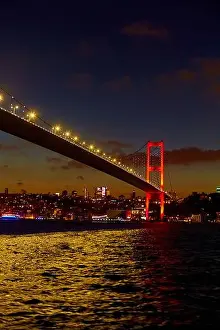 Light Night Prints: Evening boat trip on the Bosphorus in Istanbul. Bosphorus Bridge, in the night lights