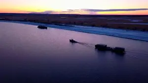 Offshore Prints: Evening scenery with sunset beautiful sky and a lonely cargo ship transporting containers with goods