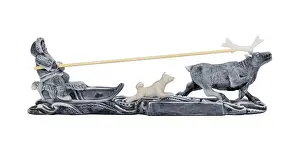 Reindeer Prints: Evenk rides a reindeer sled with a dog running alongside