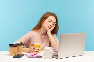 Exhausted Prints: Exhausted bored woman, office employee surrounded by coffee cups in workplace