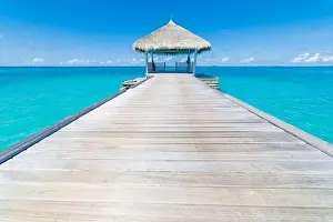 Exotic Paradise. Travel, tourism and vacations concept. Tropical resort and infinity blue sea, Maldives, Ari atoll