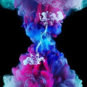 Hourglass Prints: Explosion of color, concept. Splashes of colored ink in water