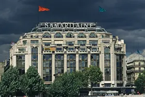 Day Sky Prints: Exterior view of La Samaritaine department store under clouded sky