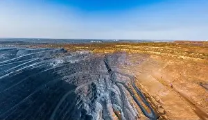 Extraction of minerals with the help of special equipment in the warm evening light in picturesque Ukraine